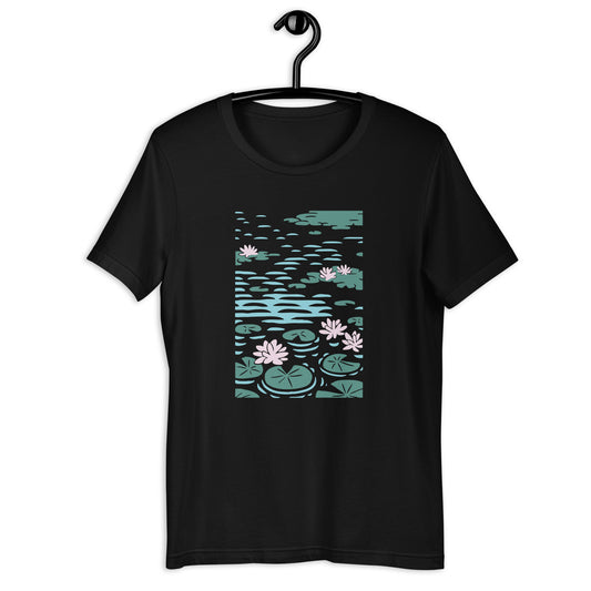 A black t-shirt with a graphic print of water lilies inspired by Claude Monet's artwork.