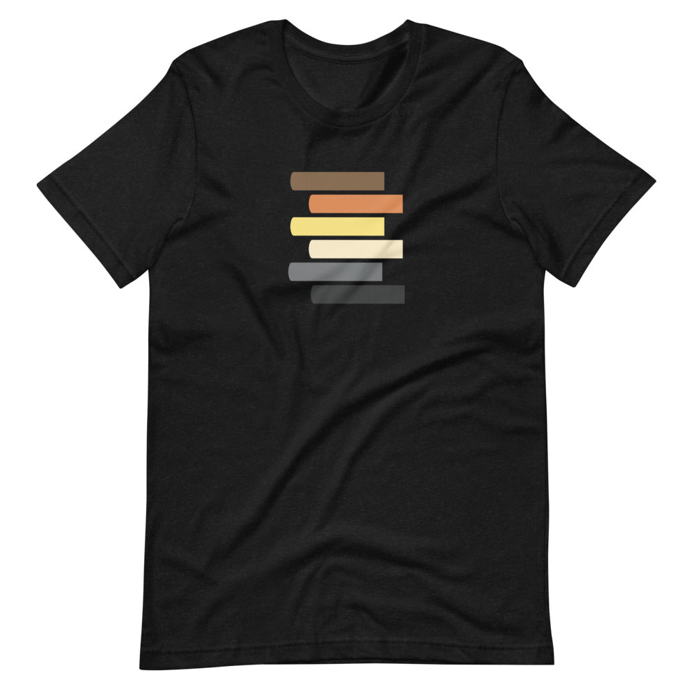 A black t-shirt with a graphic design featuring horizontal lines in various shades of brown, black, white, and yellow on the front.