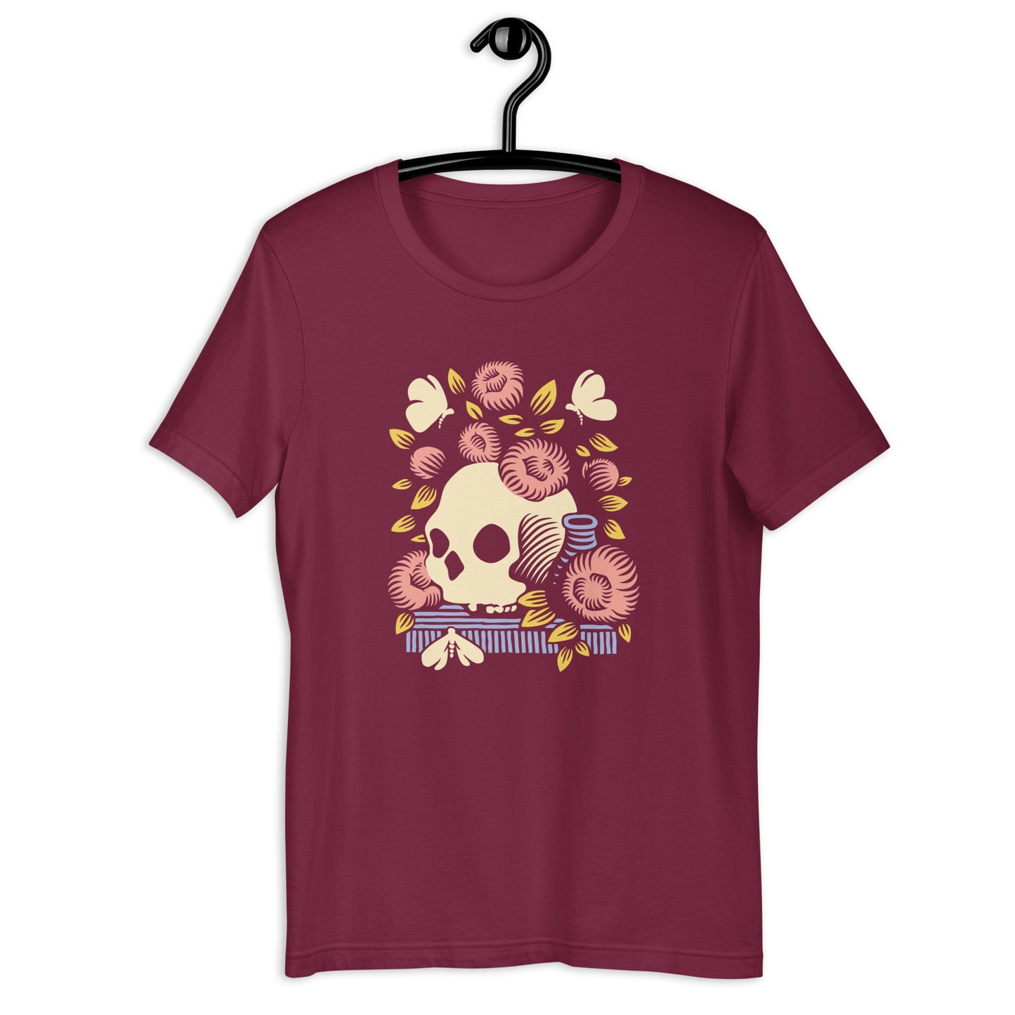 A maroon crew neck t-shirt with a graphic print of a skull surrounded by flowers, inspired by a Vanitas still life painting.