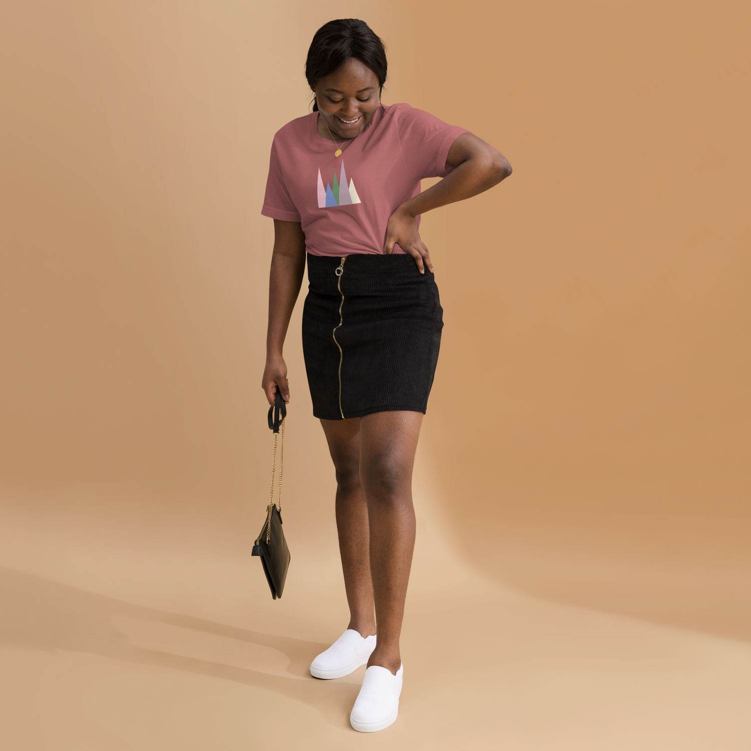 Women posing in a t-shirt from the geometric collection.