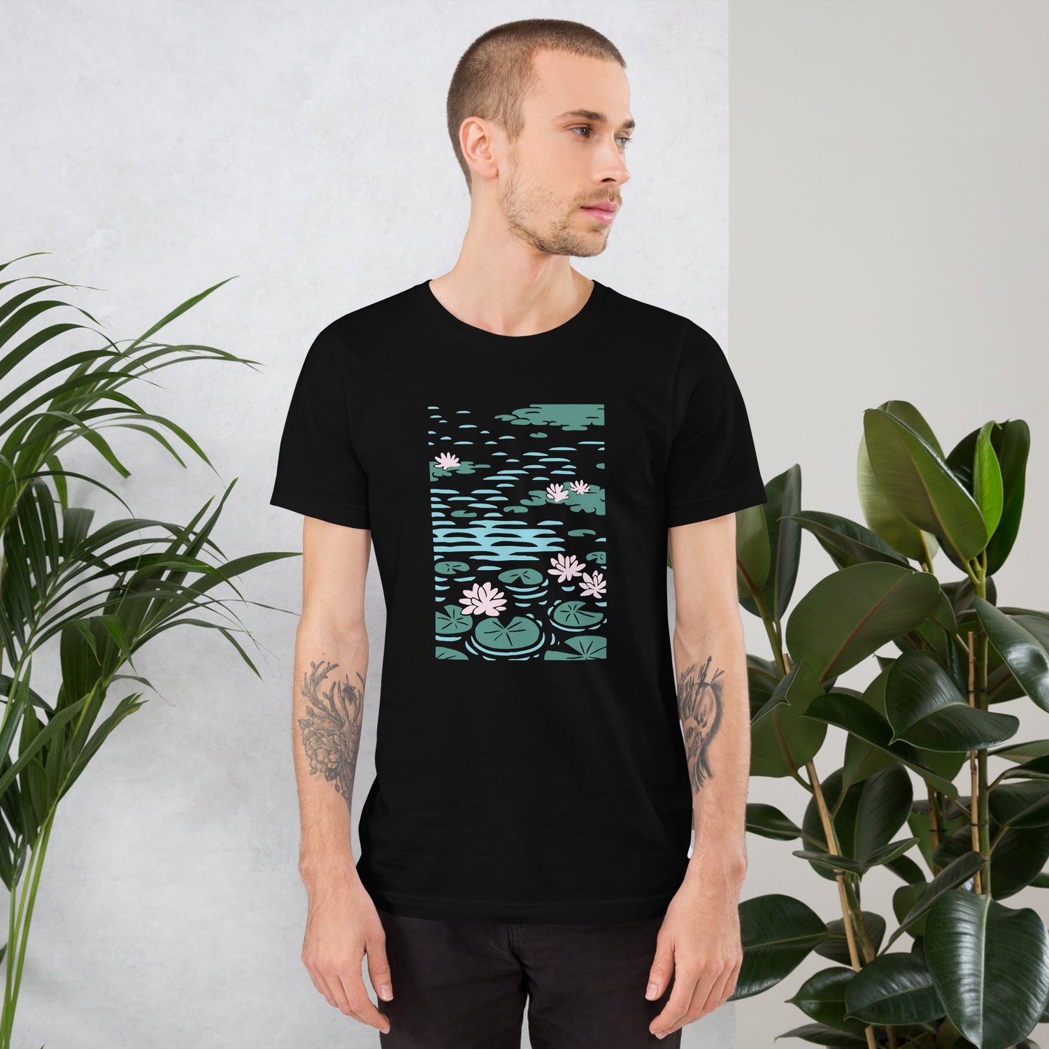 Man modeling a Monet-inspired t-shirt  from the Spring 2025 collection.